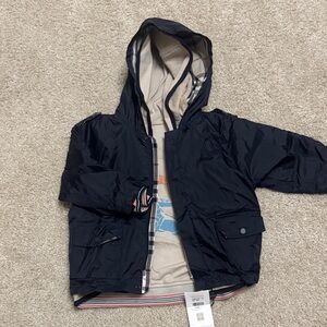 Authentic Burberry Black 2-in-1 Jacket with Beige and Blue Accents hoodie.